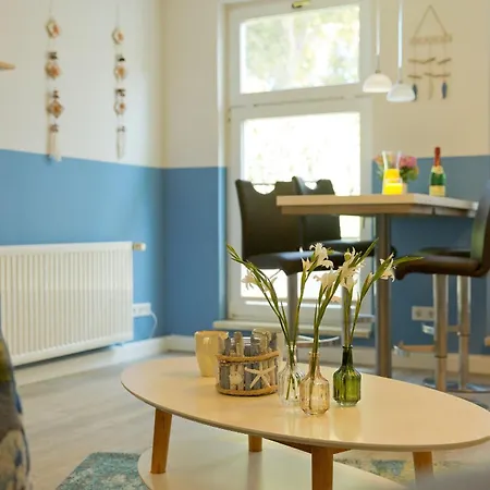 Zum Weissen Roessl App Strandmuschel * הרינגסדורף